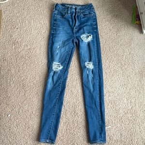 Blue ripped skinny jeans